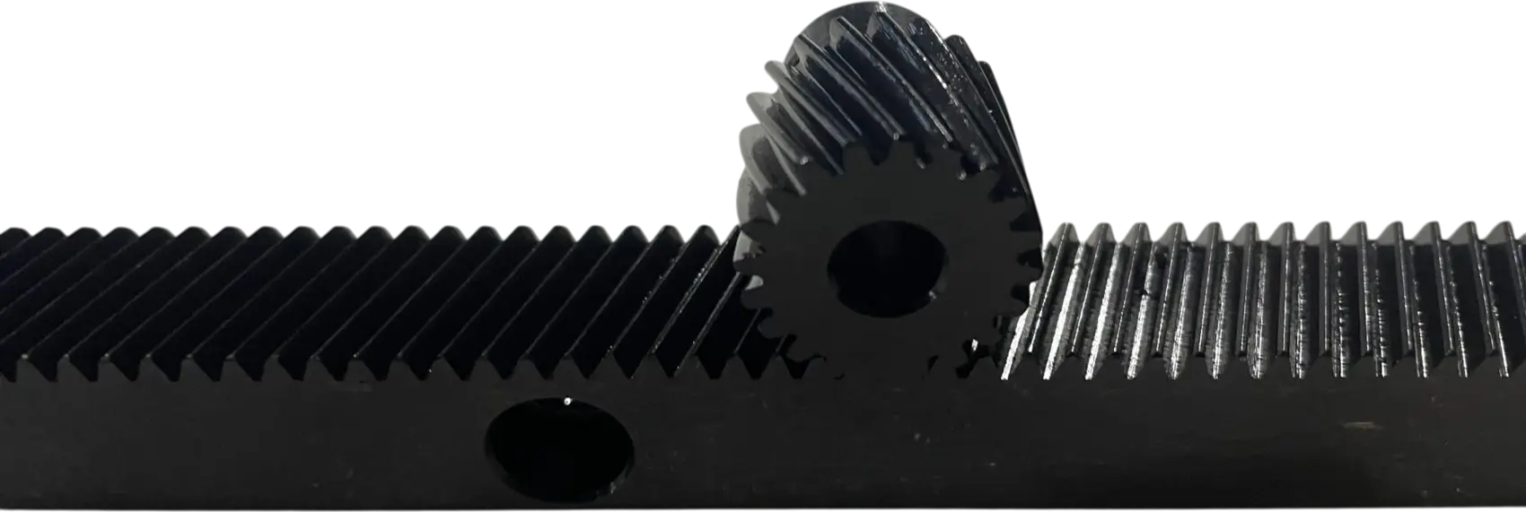 Gear rack meshing with a machined pinion